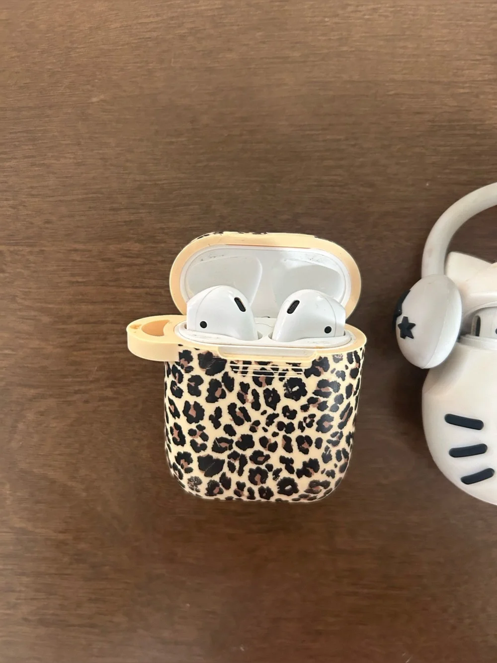 3 pairs of airpods with cases